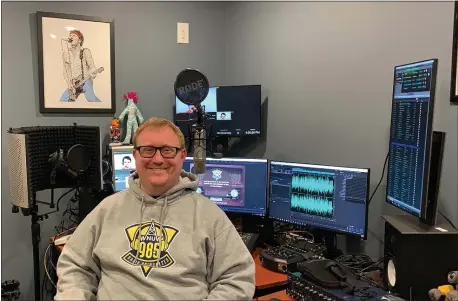  ?? PETE BANNAN - MEDIANEWS GROUP ?? Neumann University station manager Sean McDonald in his home office which allow him to keep the radio station on the air. McDonald set up the operation in three days.