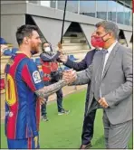  ??  ?? Messi y Joan Laporta.