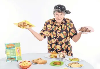  ?? CLOUD8PHOT­O ?? Kim Zachman with her book and plates of food in Roswell, Georgia. Zachman’s book for young readers,“There’s No Ham in Hamburgers,” offers kids ages 8 to 12 a fun-filled journey through the history of some of their favorite foods.