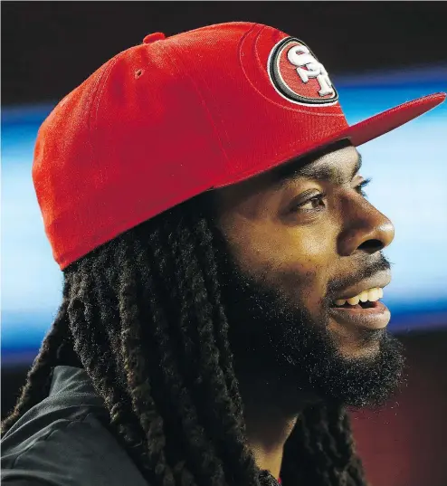  ?? — THE ASSOCIATED PRESS FILES ?? San Francisco defensive back Richard Sherman, smiling on the sidelines during last week’s pre-season game against the Los Angeles Chargers, says he’s feeling well rested and “ready to go.”