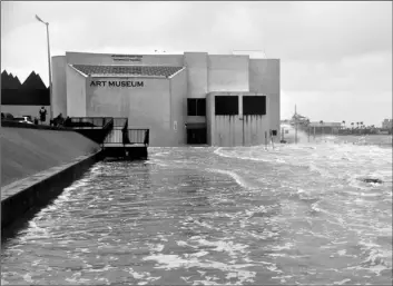  ?? Annie Rice/Corpus Christi Caller-Times via AP ?? The Art Museum of South Texas is seen flooding during Hurricane Hanna, on Saturday in Corpus Christi, Texas.