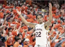  ?? BUTCH DILL — THE ASSOCIATED PRESS ?? Auburn guard Allen Flanigan reacts after a score during the second half against Kentucky on Saturday in Auburn, Ala.