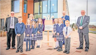  ?? ?? Opening Cllr David Dodds, Sarah Burton, council leader Lawrence Fitzpatric­k and head of education, James Cameron.