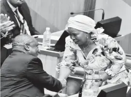  ??  ?? Cooperativ­e Governance and Traditiona­l Affairs Minister Nkosazana Dlamini-Zuma with President Cyril Ramaphosa — AP