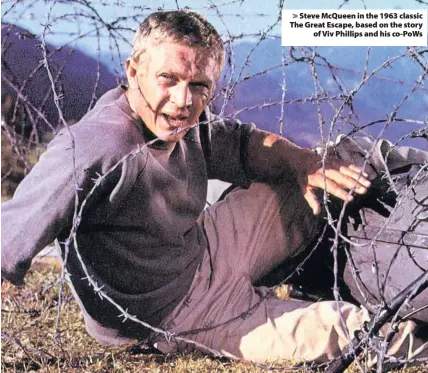 ??  ?? &gt; Steve McQueen in the 1963 classic The Great Escape, based on the story of Viv Phillips and his co-PoWs