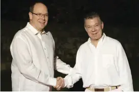  ?? FOTO EFE ?? En la ciudad de Cartagena el príncipe Alberto II de Mónaco y el presidente Santos firmaron acuerdo de entendimie­nto.