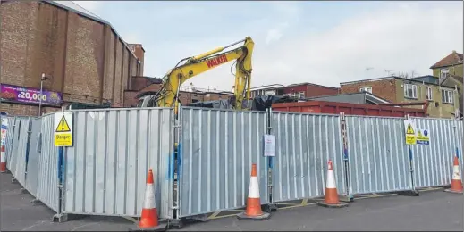  ??  ?? The digger demolishin­g the Vicarage Lane public toilets