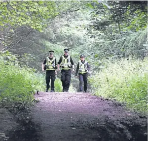  ?? Picture: Mhairi Edwards. ?? There was a large police presence in Templeton Woods yesterday as officers scoured the area following the alleged attack.