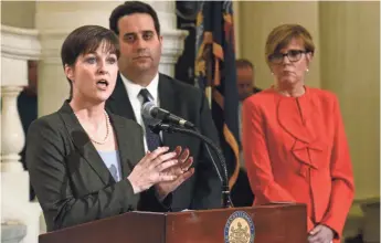  ?? MARC LEVY, AP ?? Pennsylvan­ia insurance chief Teresa Miller, left, says insurers must know the rules.