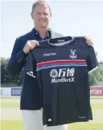  ?? — Reuters ?? New Crystal Palace manager Frank de Boer poses with the club shirt.