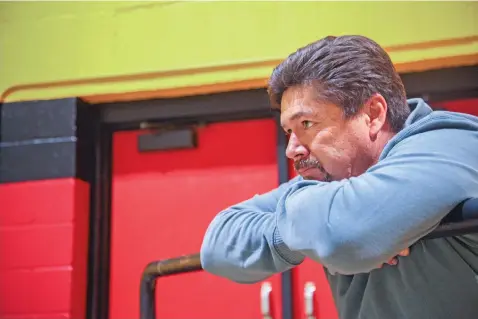  ?? GABRIELA CAMPOS/NEW MEXICAN FILE PHOTO ?? Richard Martinez, former Española Valley High School boys basketball coach, waits for his daughter in February 2018 after the Lady Sundevils won the District 2-5A championsh­ip. Martinez might soon be coaching again, this time at Mesa Vista.