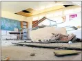  ?? Pictures: ARETHA LINDEN ?? WHAT A DISGRACE: Schornvill­e Primary SGB members Mzwandile Vaaiboom and Zendzile Aries point at some of the damage at the school. Parents have described the school as a death trap and a tragedy waiting to happen.