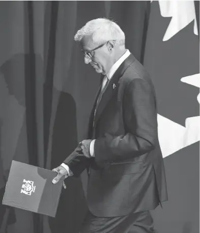  ?? ERNEST DOROSZUK / POSTMEDIA NEWS FILES ?? Ontario’s finance minister Vic Fedeli finishes a press conference following a speech to the Economic Club of Canada in Toronto last Friday, when he revealed Ontario faces a $15-billion deficit for the current fiscal year.