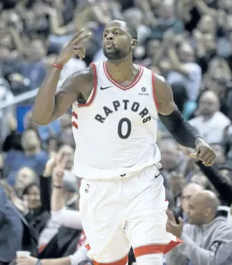  ?? CHRIS YOUNG/THE CANADIAN PRESS ?? Toronto Raptors’ forward C.J. Miles celebrates hitting a three-point shot during first half NBA basketball action against the New York Knicks, in Toronto, on Nov. 17.