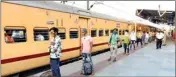  ?? PTI ?? Migrants who have arrived from Nashik follow social distancing while deboarding a train at Charbagh railway station, in Lucknow, Sunday