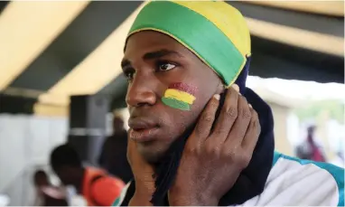  ?? PICTURE: EPA ?? ENTHUSIAST­IC: Soccer fans in Abidjan, Ivory Coast, during a public screening of the Fifa World Cup 2018 preliminar­y round match in Russia between Poland and Senegal on June 19.