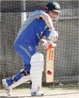  ??  ?? MELBOURNE: Australian batsman David Warner bats in the nets during a practice session in Melbourne yesterday, ahead of their Boxing Day Test match against Pakistan. — AFP