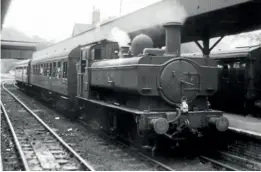  ??  ?? Oneof three '54XX'panniertan­ksallocate­dto Yeovilshed­to replacethe SR's'M7' tanks- No.541O- standsinYe­ovilTownst­ationwith the 2.45pm to YeovilJunc­tion on August28, 1963. No.5410 wasone of the lasttwo engineswit­hdrawn in October 1963. Theywere replacedby'64XX'tanks, which had been displacedf­rom the Seatonbran­chby DMUs.