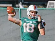  ?? CHARLES TRAINOR JR. / MIAMI HERALD ?? Miami quarterbac­k Tate Martell was the backup to Dwayne Haskins at Ohio State last season, where he completed 23 of 28 passes. He was granted a hardship waiver to be eligible to play this season with Miami.