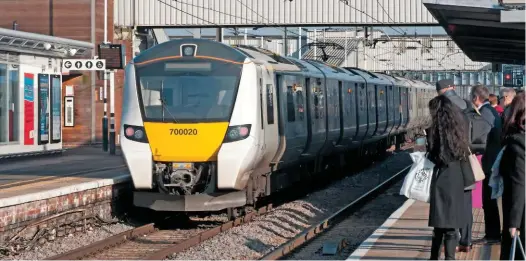  ?? PETER FOSTER. ?? Govia Thameslink Railway 700020 stands at Peterborou­gh on March 19. These new trains have entered traffic on commuter routes at a time when passenger numbers have begun to decline. The reasons are unclear, however the ways in which people work have...