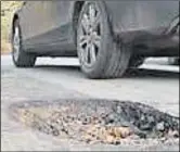  ??  ?? Potholes are among the dangers faced by motorists in Ashford