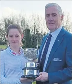  ?? ?? Paula Walsh receiving the Trophy for winning the Munster Women’s Senior Amateur Open Championsh­ip.