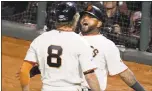  ?? STAFF ARCHIVES ?? Hunter Pence, left, is one Giant all in favor of a reunion with former star Pablo Sandoval.