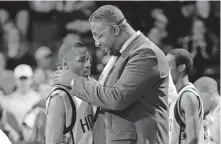  ?? [PORTER BINKS/USA TODAY] ?? Coach John Thompson talks to Allen Iverson during a 1996 game against St. John's. Thompson, the imposing Hall of Famer who turned Georgetown into a basketball powerhouse and became the first Black coach to lead a team to the NCAA men's title, died Aug. 30 at age 78.