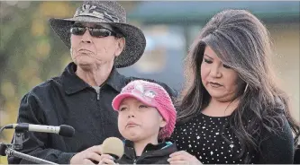  ?? BARRY GRAY THE HAMILTON SPECTATOR ?? Surrounded by family, including her mother Sonya, Makayla Sault, 11, spoke at an event in Ohsweken. Makayla and her family rejected chemothera­py for her cancer, choosing instead traditiona­l native healing.