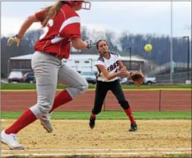  ?? AUSTIN HERTZOG - DIGITAL FIRST MEDIA ?? Boyertown second baseman Veronica Maryanski throws to first base for an out to beat out Owen J. Roberts’ Claudia Alldred during Friday’s game.