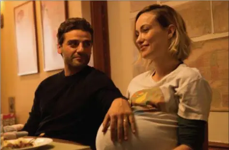  ?? AMAZON STUDIOS ?? Oscar Isaac and Olivia Wilde play a couple about to have a child in “Life Itself.”