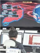  ?? YONHAP VIA EPA ?? Employees monitor possible WannaCry ransomware cyberattac­ks at the Korea Internet and Security Agency (KISA) in Seoul. WannaCry locked hundreds of thousands of computers.