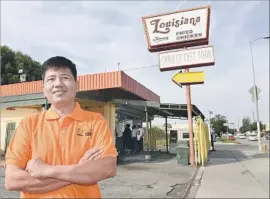  ?? Wally Skalij Los Angeles Times ?? MICHAEL ENG bought a taco stand at 91st Street and Central Avenue in the 1990s and converted it to a Louisiana Famous Fried Chicken.