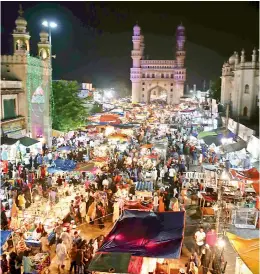  ?? — P. SURENDRA ?? People throng the night bazaar at Old City for Ramzan shopping.