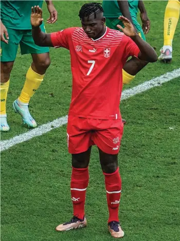  ?? ?? Switzerlan­d's Breel Embolo holds his hands up after scoring during the World Cup group G soccer match between Switzerlan­d and Cameroon
