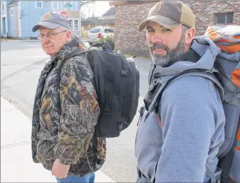  ??  ?? Andre Boudreau and Todd Muise are organizing a rucksack march to be held April 14 to help raise awareness about the support group available for veterans suffering with PTSD, operationa­l stress injury, anxiety, depression or substance abuse.