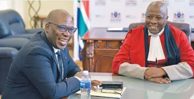  ?? Picture: Neil McCartney ?? PROMISES. New Gauteng premier Panyaza Lesufi is sworn in by Deputy Judge President Aubrey Ledwaba after being voted in at the Gauteng legislatur­e in Johannesbu­rg yesterday.