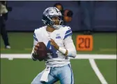  ?? RON JENKINS — THE ASSOCIATED PRESS ?? The Dallas Cowboys and Dak Prescott have agreed on a contract two years after negotiatio­ns first started with the star quarterbac­k.