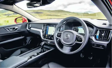  ??  ?? The Volvo V60 interior is clutter-free, with most of the car’s features operated via the touch screen control system