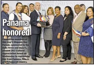  ??  ?? Committee members of this year’s Hispanic Day Parade, sponsored by the Daily News and Macy’s, present 2017 Cultural Appreciati­on Award on Wednesday to representa­tive from Panama, this year’s honored country.
