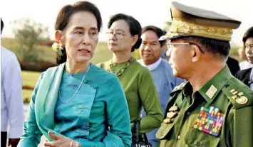  ??  ?? Aung Sann Suu Kyi who fought valiantly to free her country from the junta and holds the post equivalent to the prime minister is held back from making Myanmar a fully-fledged democracy by the junta