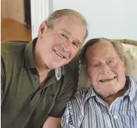  ?? APPhOTO ?? LIKE FATHER, LIKE SON: Former Presidents George W. Bush and George H.W. Bush pose for a picture on the elder Bush’s 94th birthday yesterday.