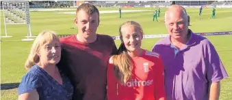  ??  ?? Alvanley Cricket Club player Sophie Ecclestone pictured with her family at Bristol after making her debut for England Ladies against Pakistan.