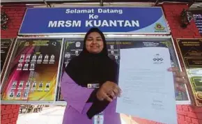  ??  ?? Arianna Sophea Adruin Shazaen of MRSM Kuantan is the champion of the secondary school category.