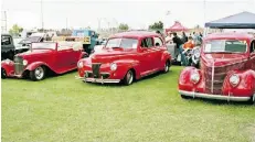  ?? DAVE HALLIDAY/EDMONTON JOURNAL/FILE ?? Three red prewar Fords stood out at an Alberta show and shine several summers ago.