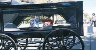  ??  ?? An early 1800s horse-drawn hearse at the 2015 Founders’ Day.