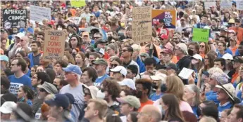  ?? GETTY IMAGES ?? Thousands of demonstrat­ors join the “March for Our Lives” against gun violence and in favor of gun restrictio­ns at a rally on Saturday near the Washington Monument.