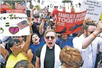  ?? ASSOCIATED PRESS FILE PHOTO ?? Protesters chant ‘Families belong together!’ June 28 as they walk to the federal courthouse in Brownsvill­e, Texas. A federal judge, responding to a plan to reunify families separated at the border, said he was having second thoughts about his belief that the Trump administra­tion was acting in good faith to comply with his orders.