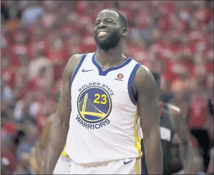  ?? PHOTOS BY NHAT V. MEYER — STAFF PHOTOGRAPH­ER ?? Golden StateWarri­ors’ Draymond Green (23) grimaces in the fourth quarter of Game 5of the NBAWestern Conference finals against the Houston Rockets at the Toyota Center in Houston on Thursday.