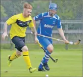  ?? Photograph: Iain Ferguson, alba.photos. ?? Fort William’s hat-trick hero Scott Knox tackles Kilmallie’s Leigh Dunning during Fort’s 7-0 win over their neighbours in the Strathdear­n Cup semi-final in 2019.